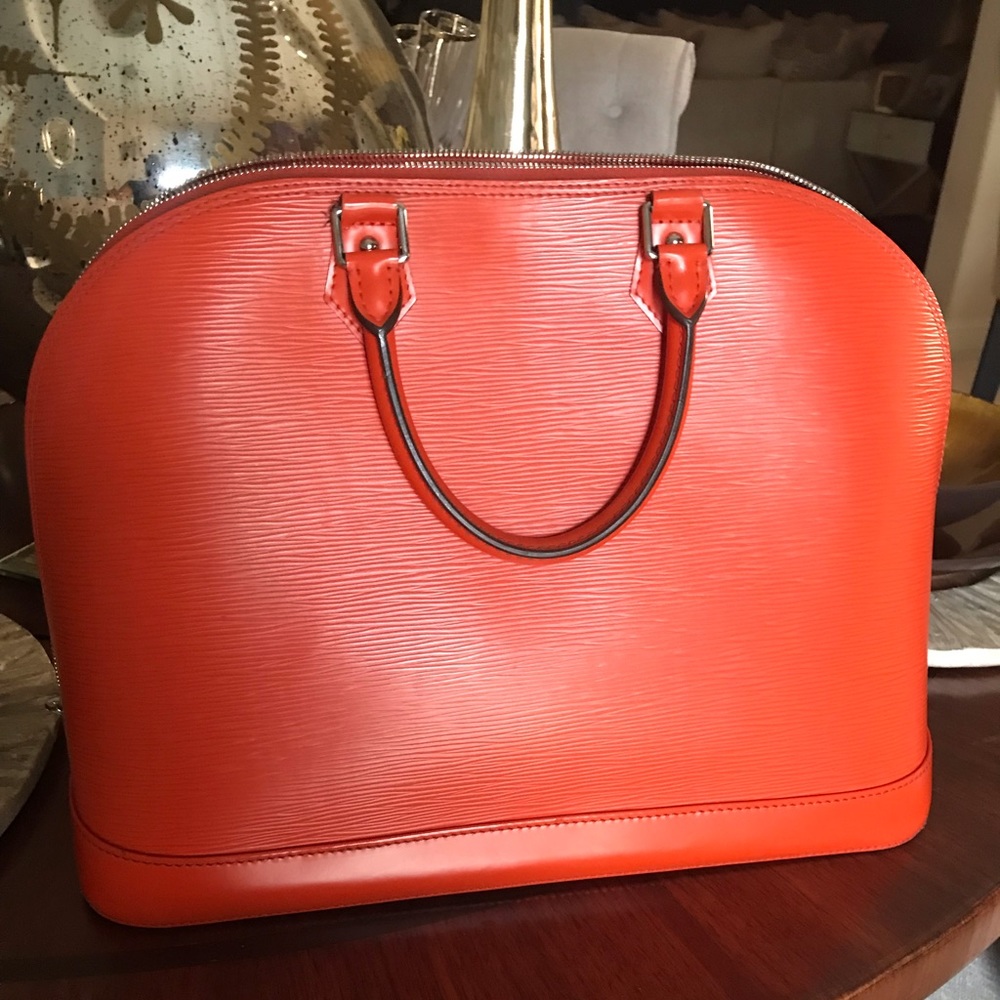 Louis Vuitton alma gm handbag
